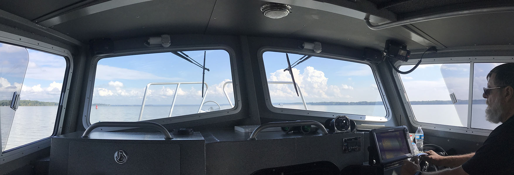 Interior Panorama of the Pilot House of a Professional Aluminum Fishing Boat.